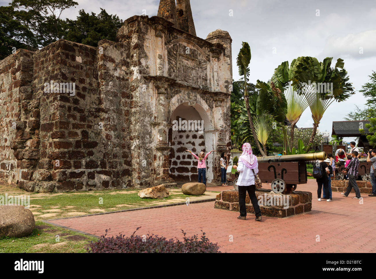 Tourists taking photographs of the historic Portuguese fort, A Famosa, in Malacca (Melaka), Malaysia Stock Photo