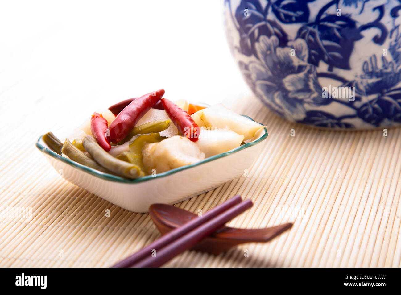 Asian pickled vegetable with a beautiful blue floral jar Stock Photo Alamy