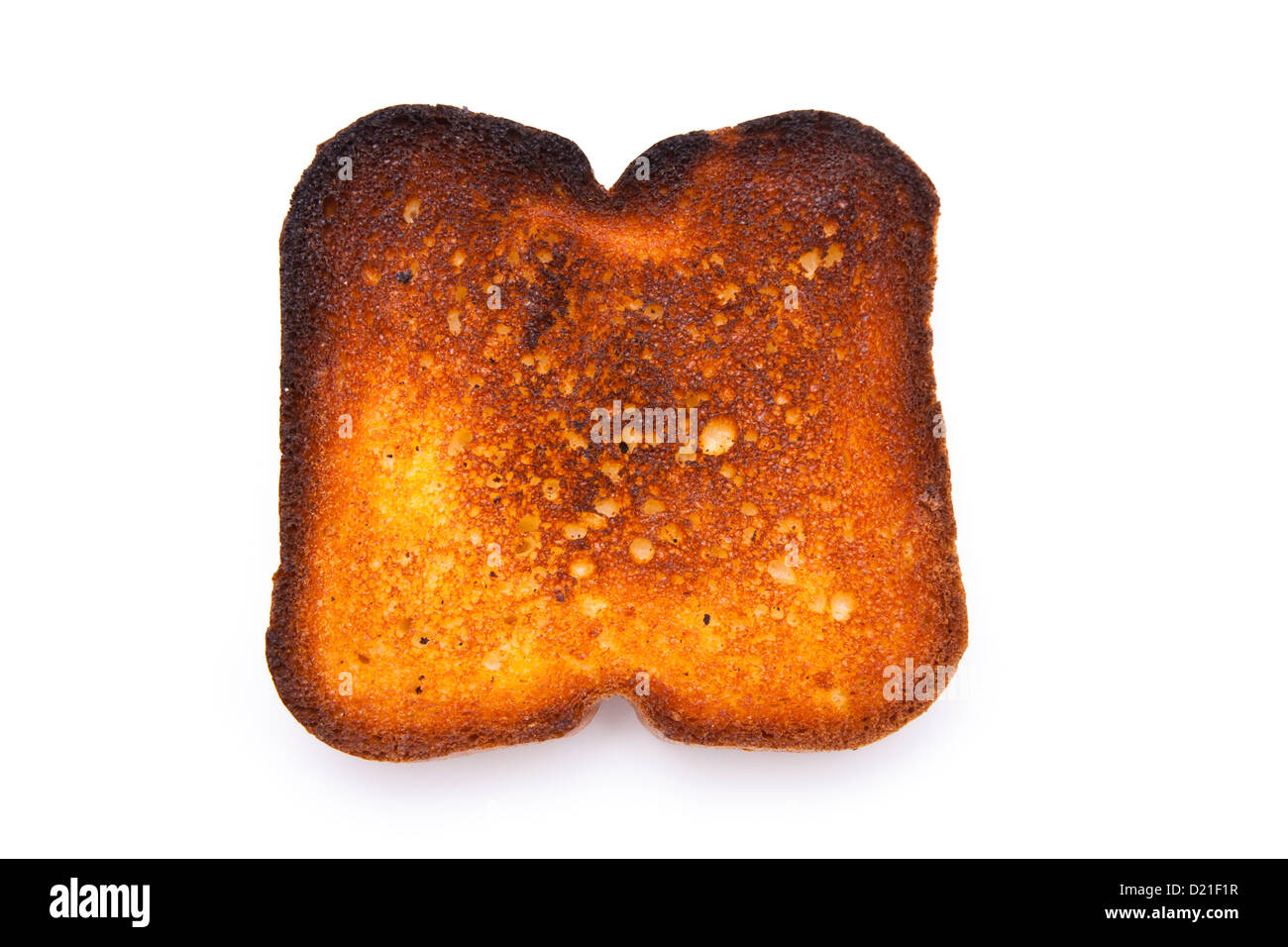 A piece of burnt toast on white background Stock Photo Alamy