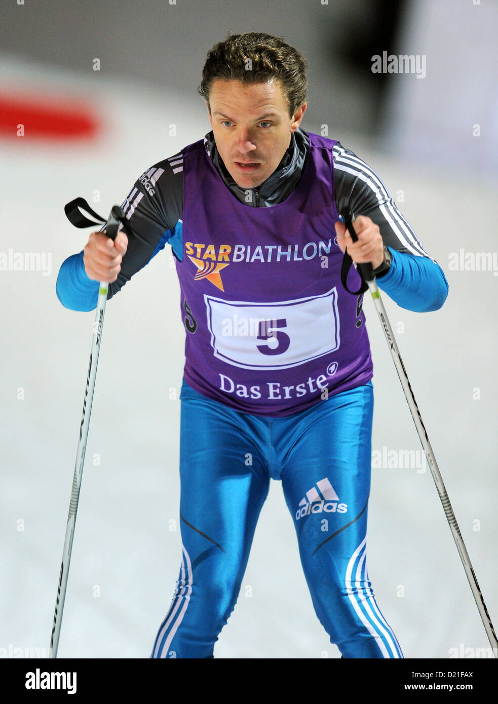 AATENTION: EMBARGO CONDITION: 10 JANUARY, 22:00 O'CLOCK - TV presenter and musician Stefan Mross in action during the Star Biathlon in Ruhpolding, Germany, 09 January 2013. Celebreties and biathlete legends competed in the Star Biathlon, which was held after the Biathlon World Cup. Photo: TOBIAS HASE Stock Photo