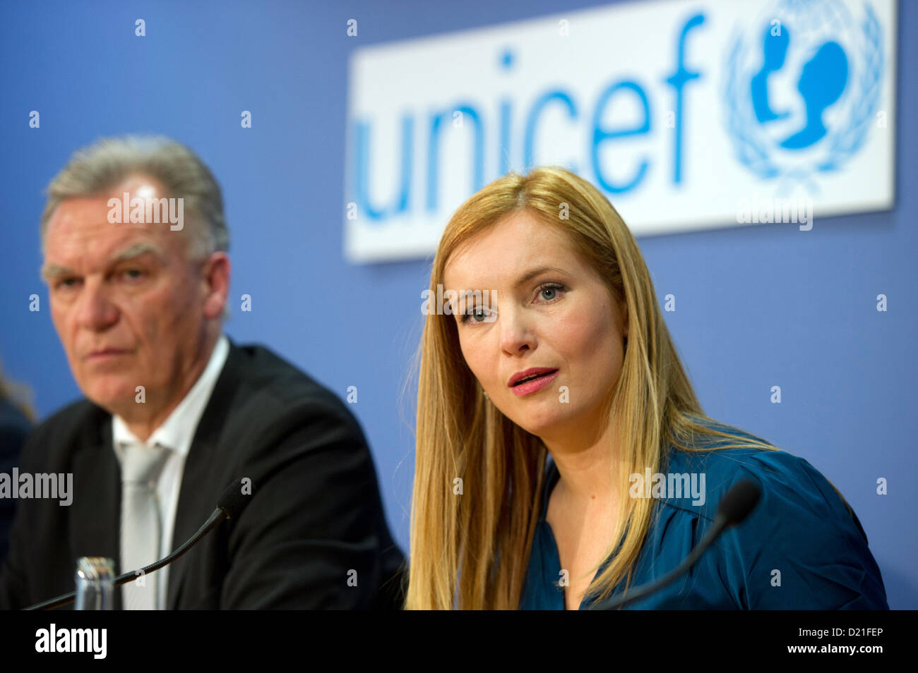 Actress Nadja Uhl (C) sits next to President of the German Federal Criminal Police Office Joerg Ziercke during a press conference in Berlin, Germany, 10 January 2013. For the broadcast of the television film 'Operation Zucker' (16 January) about human trafficking and child abuse, Ziercke is discussing the topic in relation to Germany. Uhl, who went to Romania to do research for the production, ivestigated child traffickers in Berlin in the movie. Photo: MARC TIRL Stock Photo