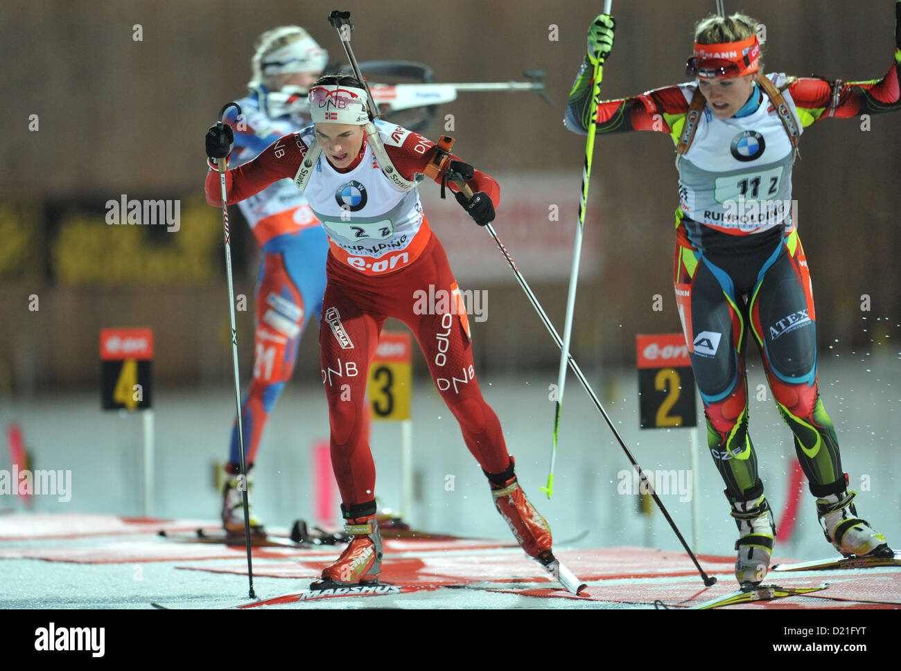 Norwegian biathlete Ann Kristin Aefedt (L) and Czech biathlete Gabriela Soukalova leave the shooting range during the women's relay event at the biathlon world cup at Chiemgau Arena in Ruhpolding, Germany, 09 January 2013. Photo: ANDREAS GEBERT Stock Photo