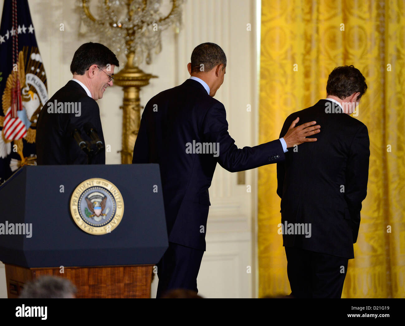 United States President Barack Obama, center, departs after naming White House Chief of Staff Jacob "Jack" Lew, left, as Secretary of the Treasury to replace Timothy Geithner, right, in the East Room of the White House in Washington, D.C. on Thursday, January 10, 2013..Credit: Ron Sachs / CNP Stock Photo