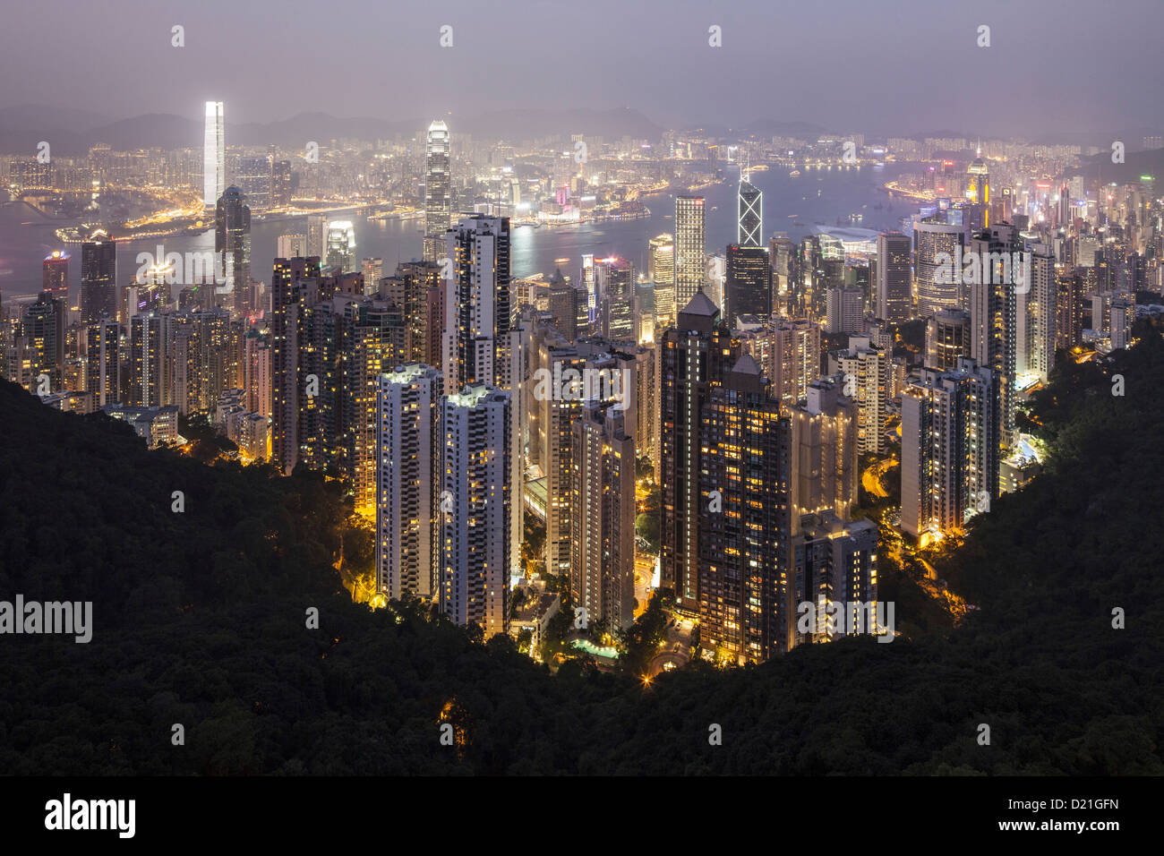View from Victoria Peak onto the high rise buildings of Hong Kong Islandand Kowloon at night, Hongkong, China, Asia Stock Photo