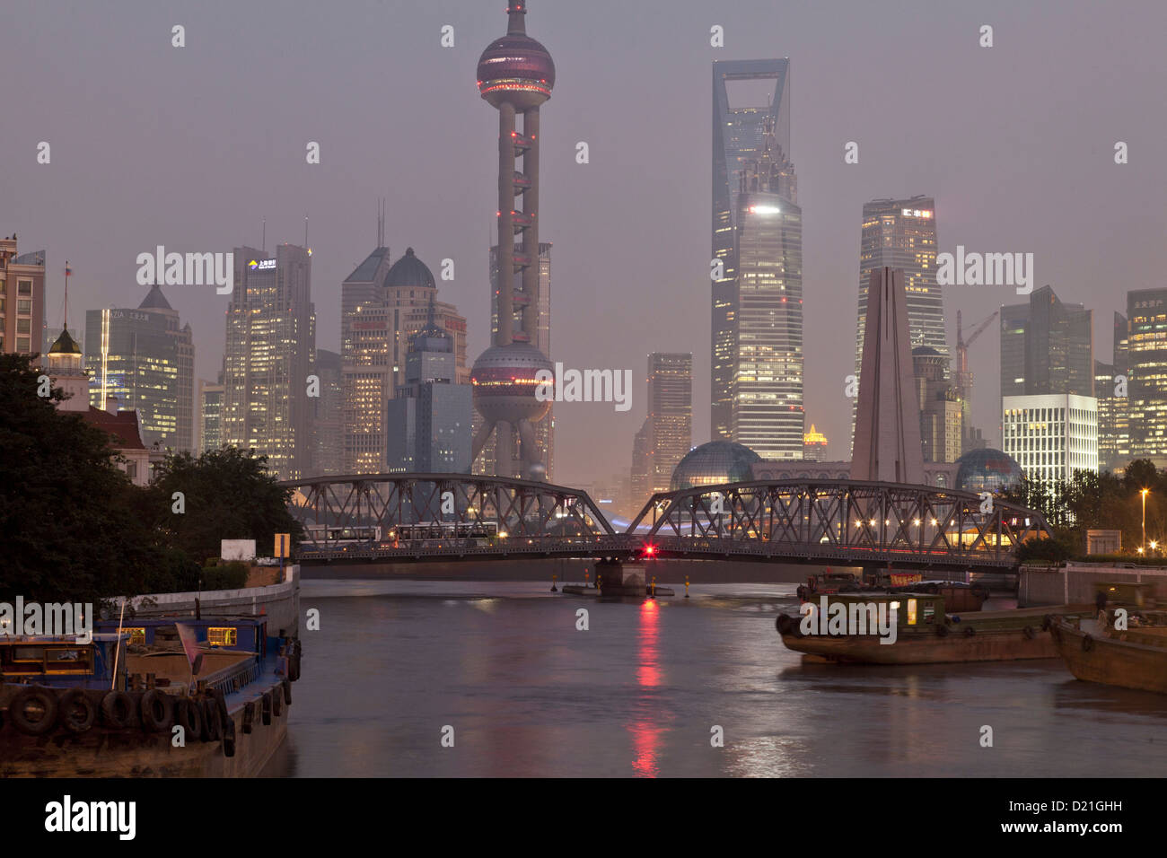 View of Huangpu River with Waibaidu bridge and Pudong skyline at night, Shanghai, China, Asia Stock Photo