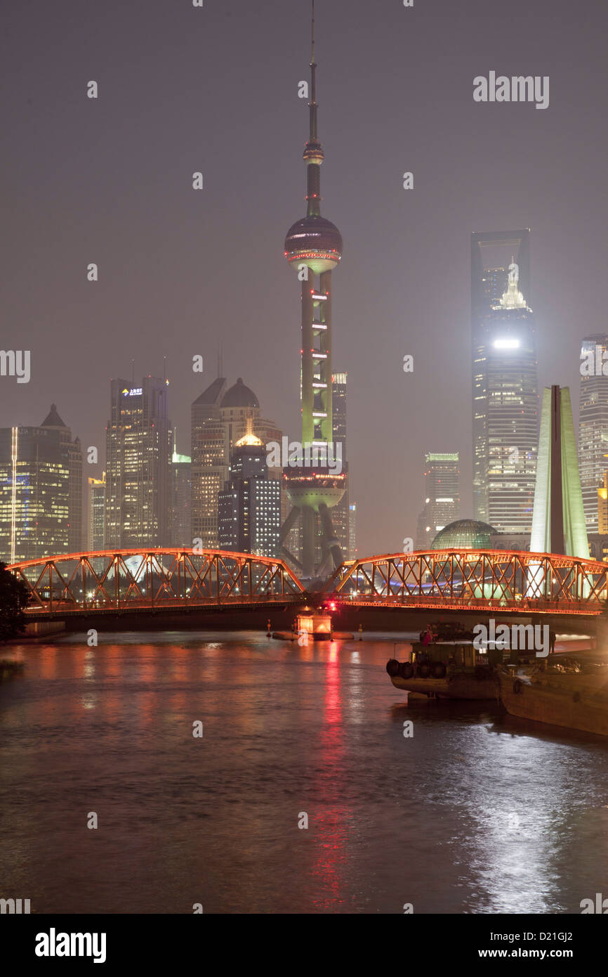 View of Huangpu River with Waibaidu bridge and Pudong skyline at night, Shanghai, China, Asia Stock Photo