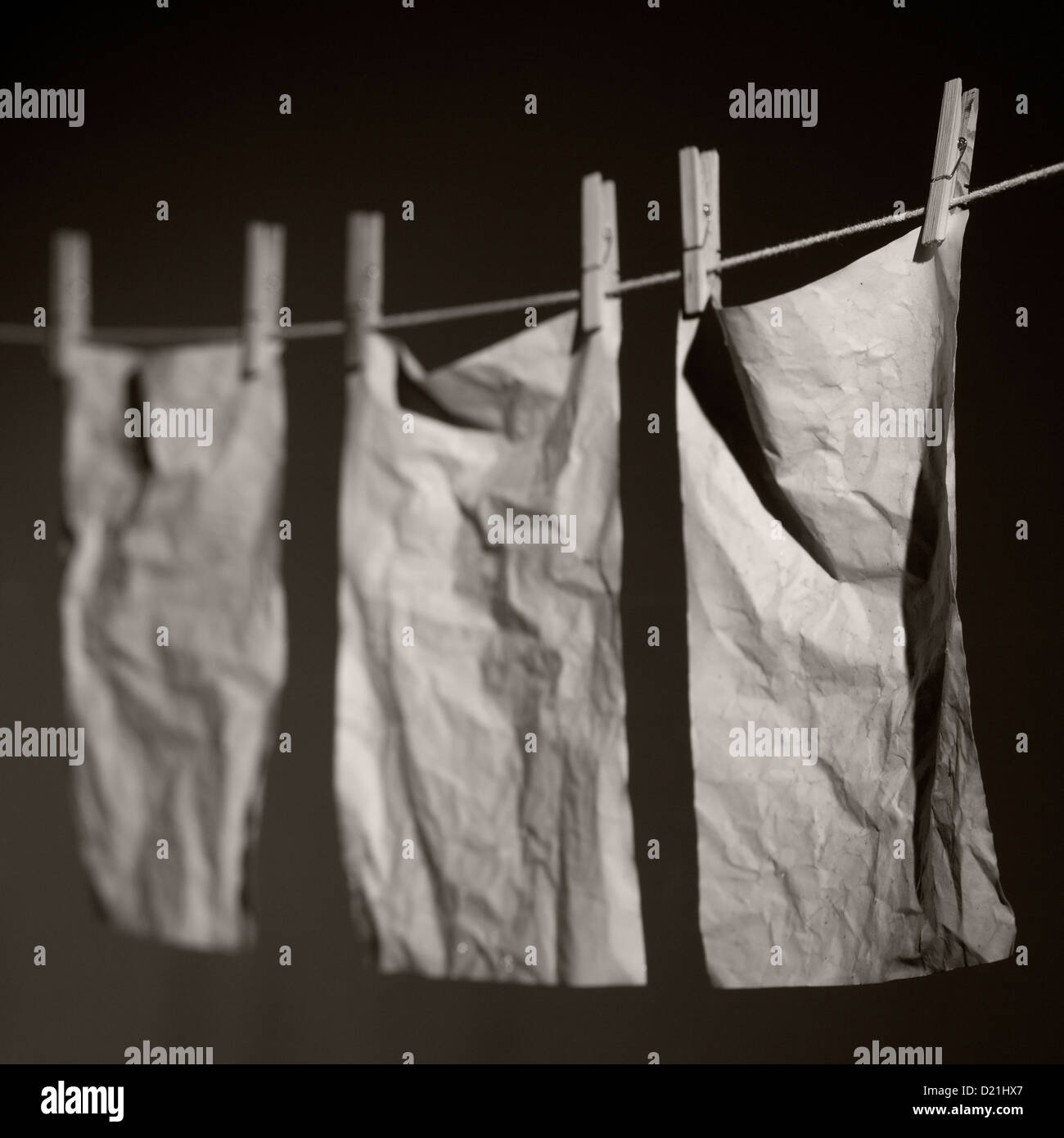 Paper drying on washing line Stock Photo Alamy