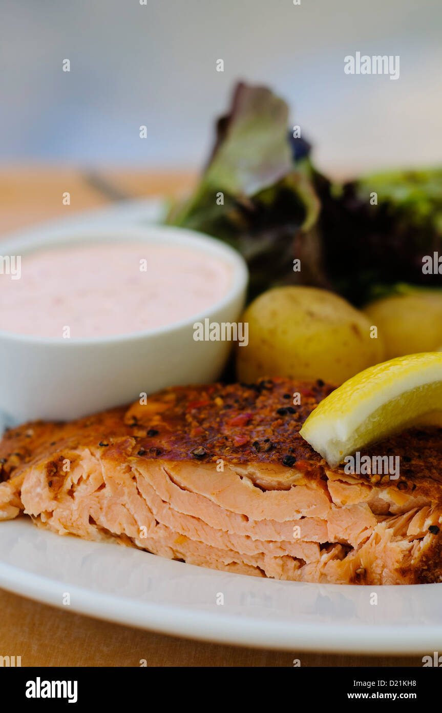 Salmon fillet, potatoes and hollandaise sauce Stock Photo Alamy