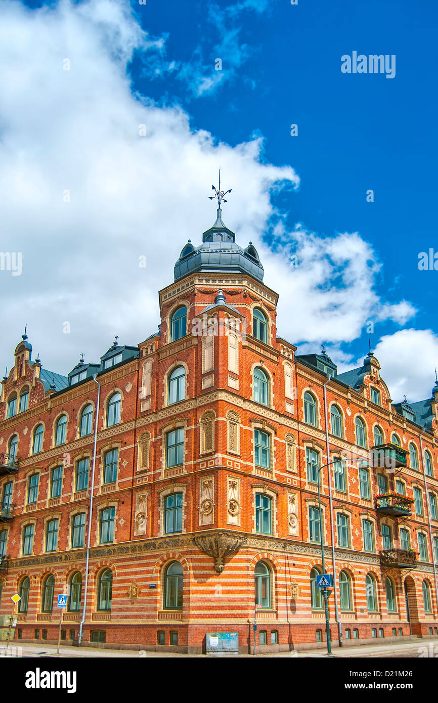 The ornate corner of an old building situated in the Swedish city of Lund Stock Photo