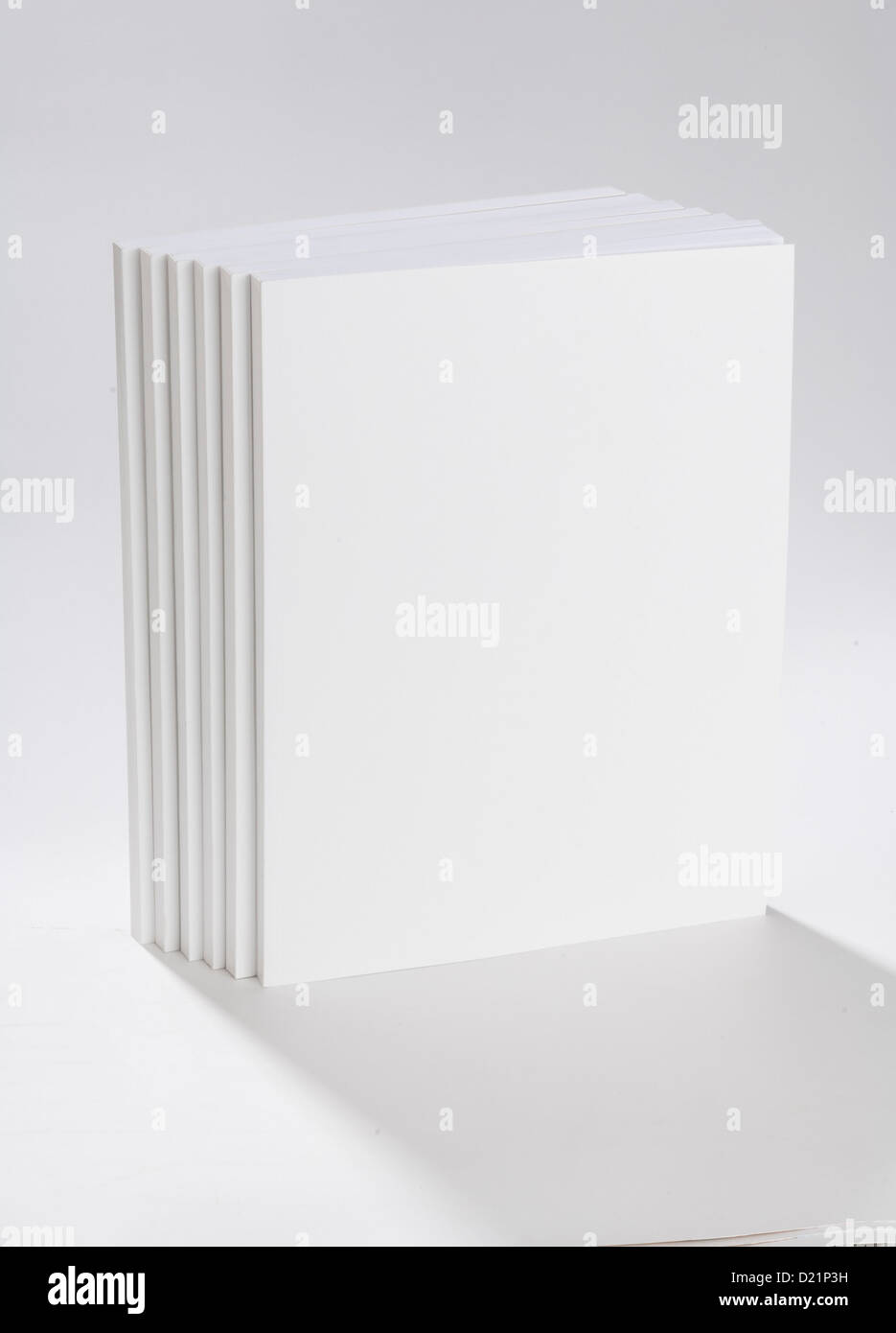 Six blank books on white ground Stock Photo