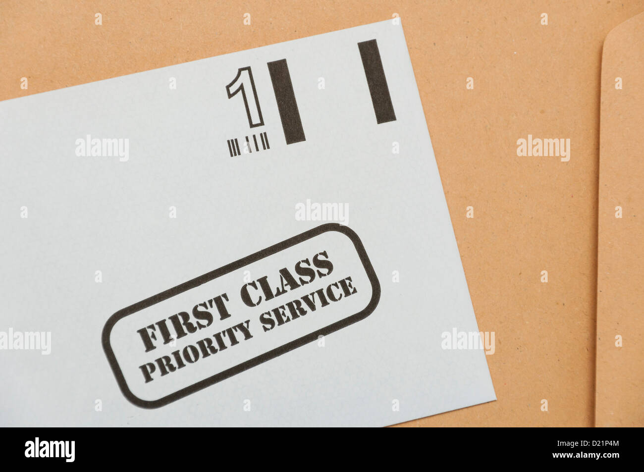 First class postage paid reply envelope. Stock Photo