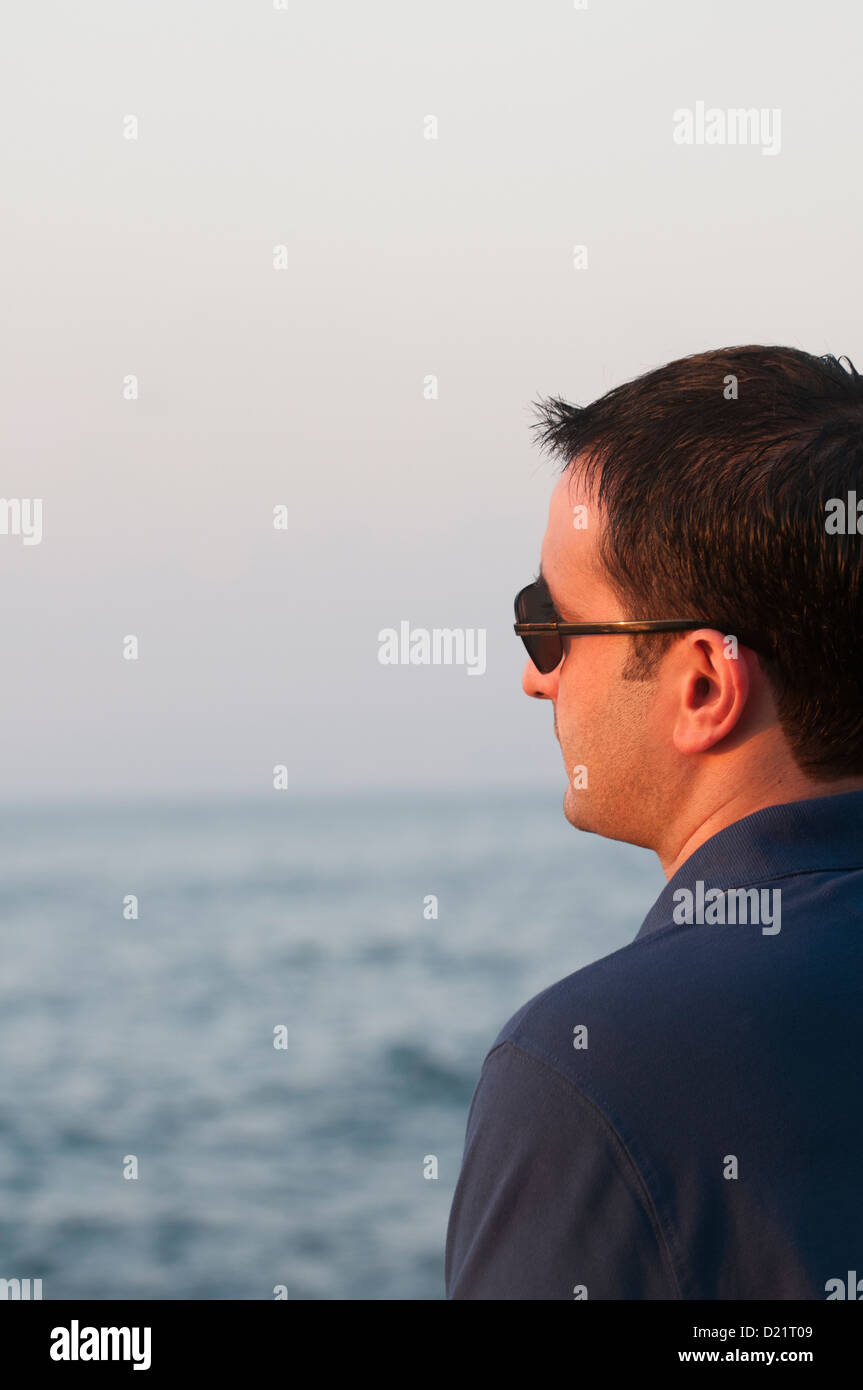 Middle eastern man looking sea hi-res stock photography and images - Alamy