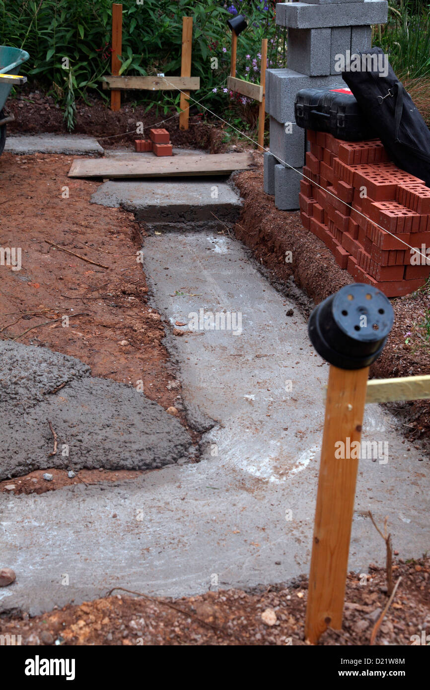 Laying the foundations of a conservatory for a house Stock Photo