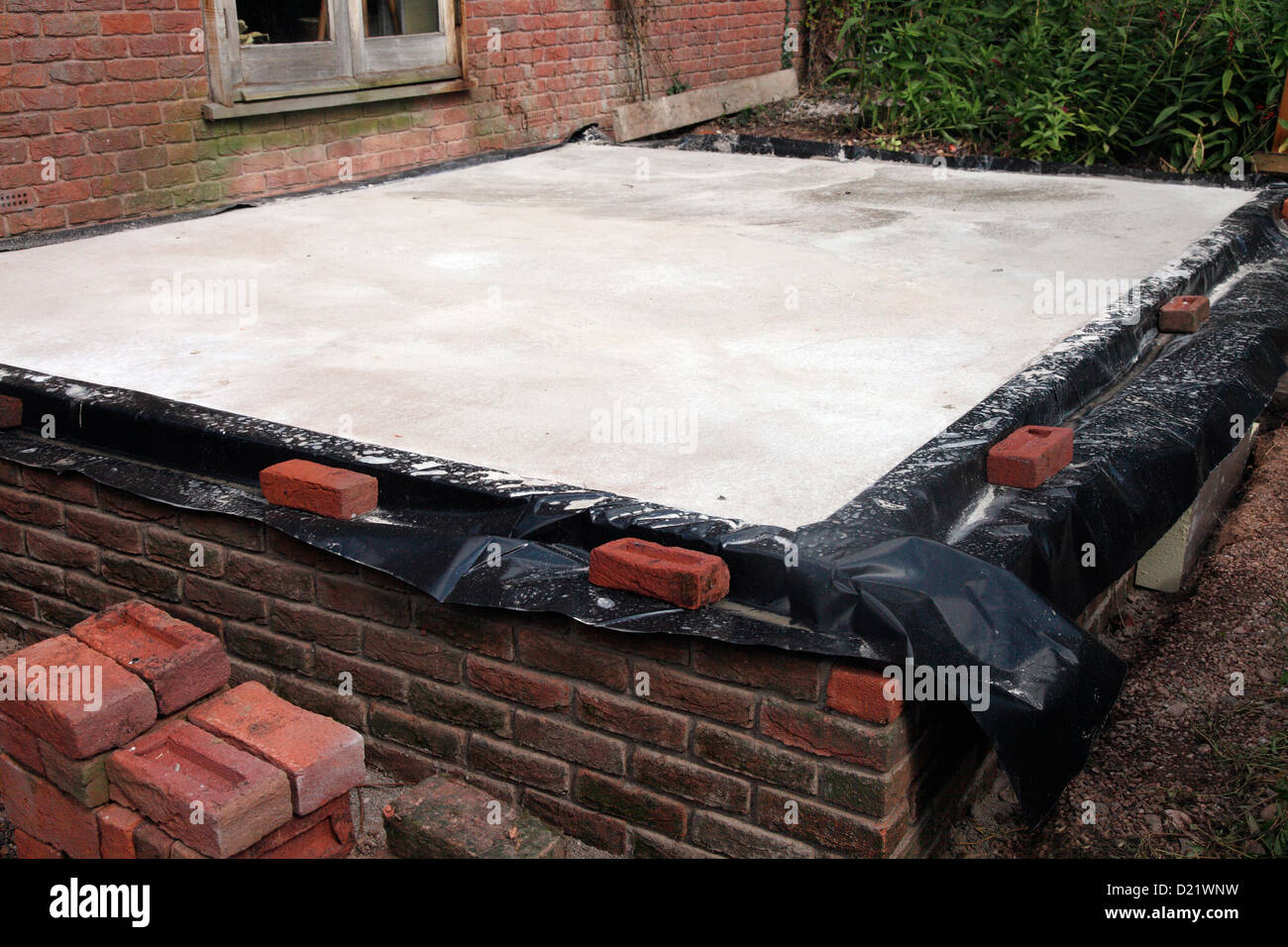 Building a conservatory dwarf walls up to damp proof course level and