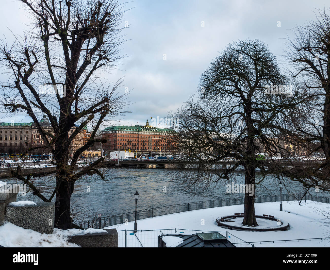 View across to the Grand Hotel from Norrbro bridge in winter, Stockholm, Sweden Stock Photo