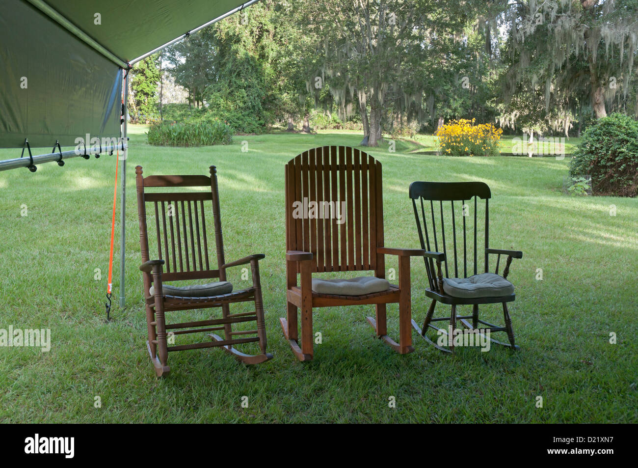 Three rocking chairs outdoors at a family gathering in North Florida