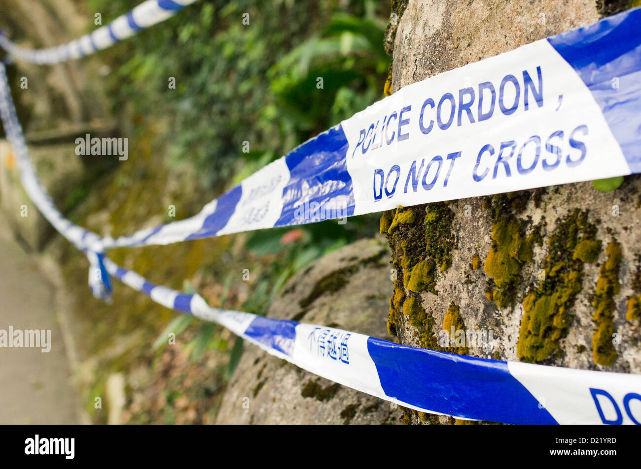 Police do not cross tape in an accident scene of land slide. Photo is taken at Hong Kong. Stock Photo