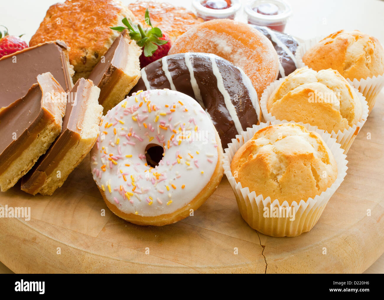 Cakes and donuts Stock Photo Alamy