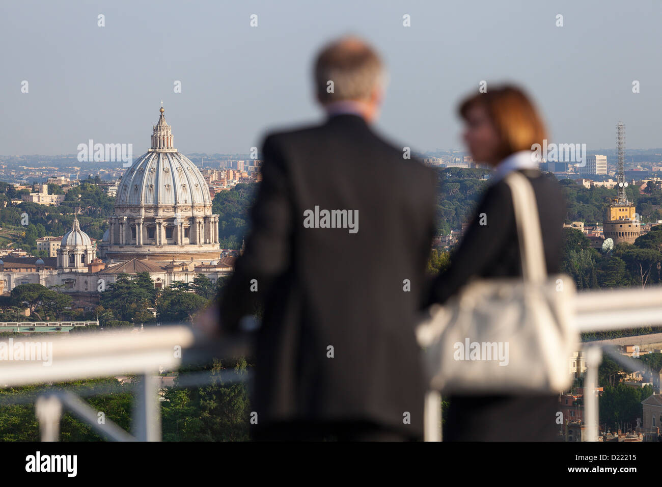 Visitors looking at Saint Peter's cathedral dome from above Stock Photo