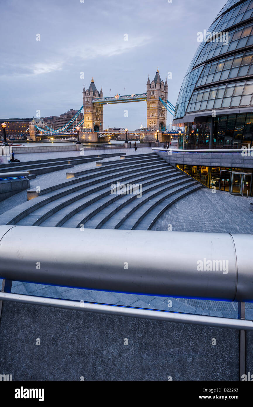 Dusk at City Hall (Architect-Sir Norman Foster) and Tower Bridge, London, England, UK Stock Photo