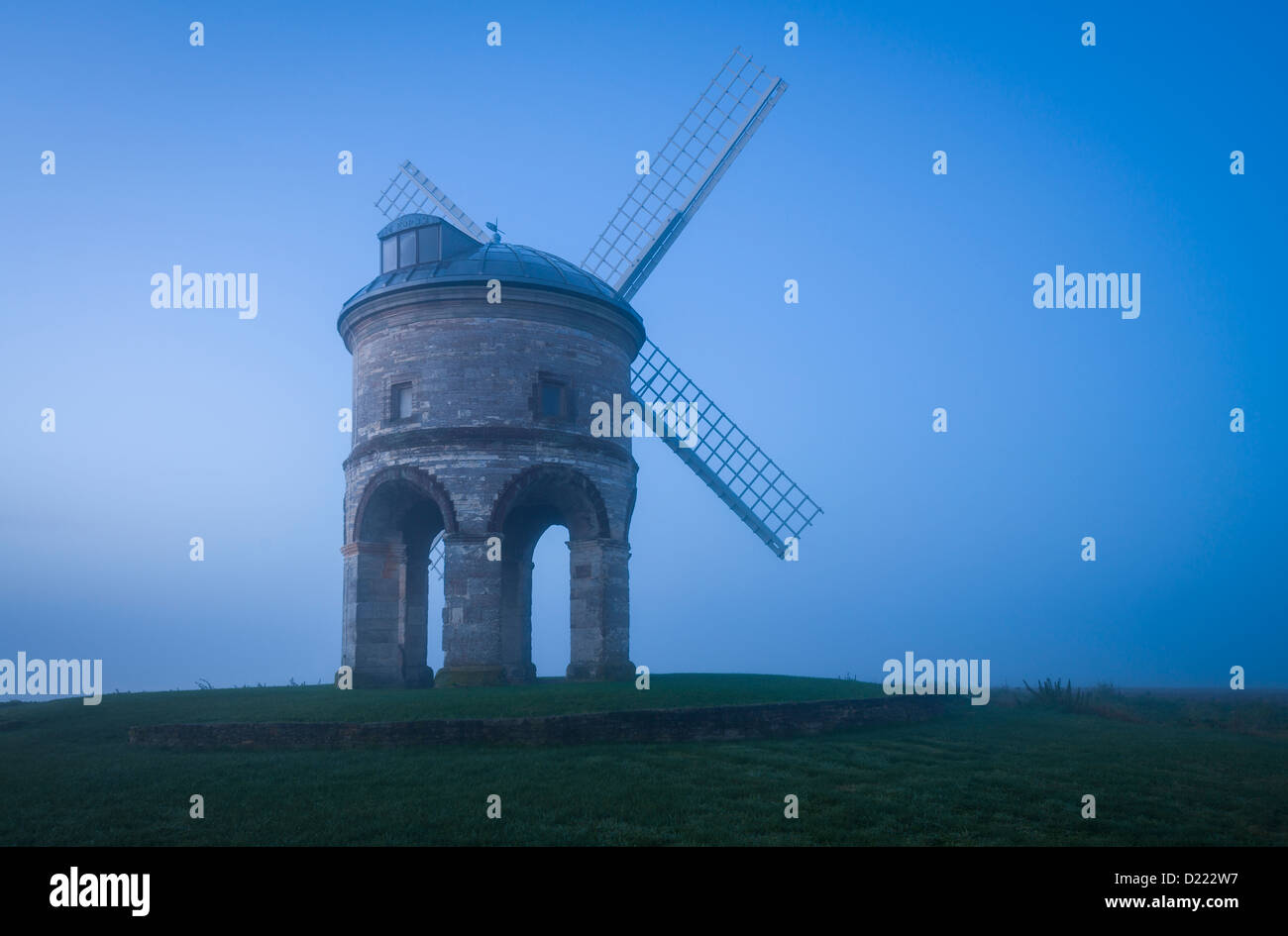 Misty Autumn dawn, Chesterton windmill, Warwickshire, UK Stock Photo