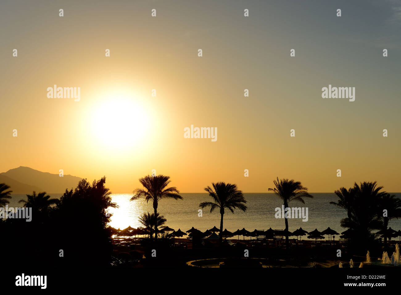 Sunrice and beach with a view on Tiran island at the luxury hotel, Sharm el Sheikh, Egypt Stock Photo