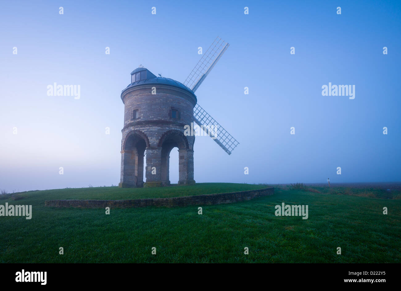 Misty Autumn dawn, Chesterton windmill, Warwickshire, UK Stock Photo