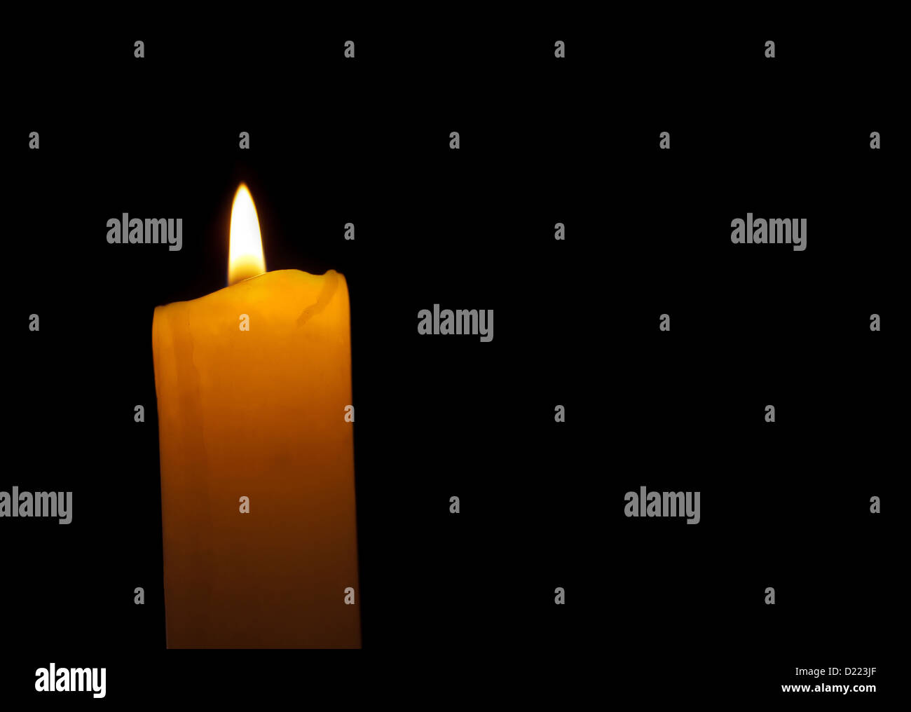 Candle isolated on black background Stock Photo - Alamy