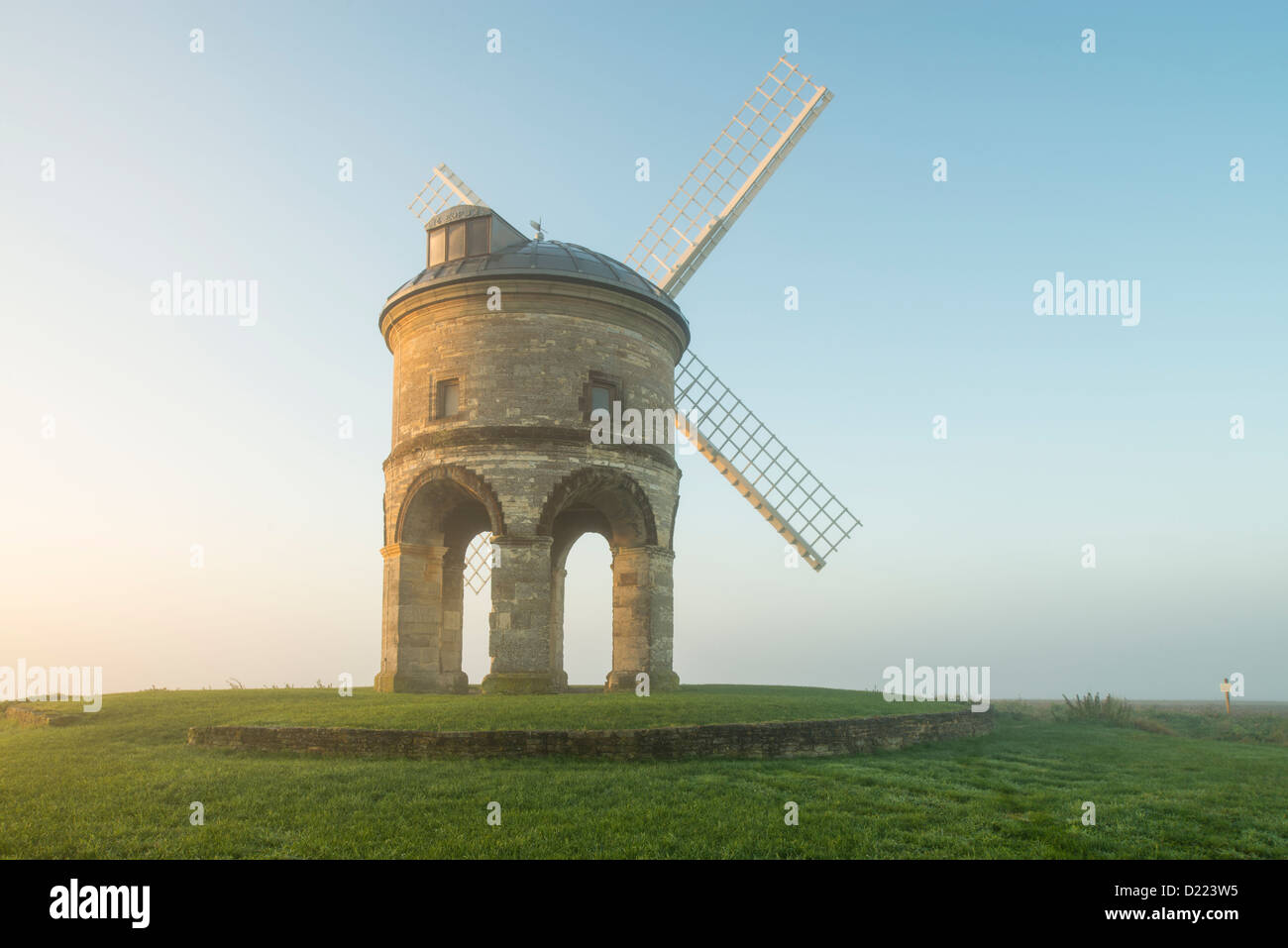 Misty Autumn sunrise, Chesterton windmill, Warwickshire, UK Stock Photo