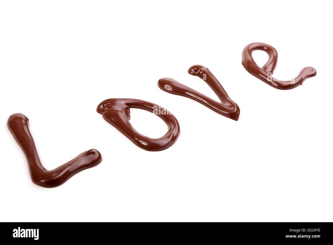 Writing and painting with chocolate love, on white background Stock