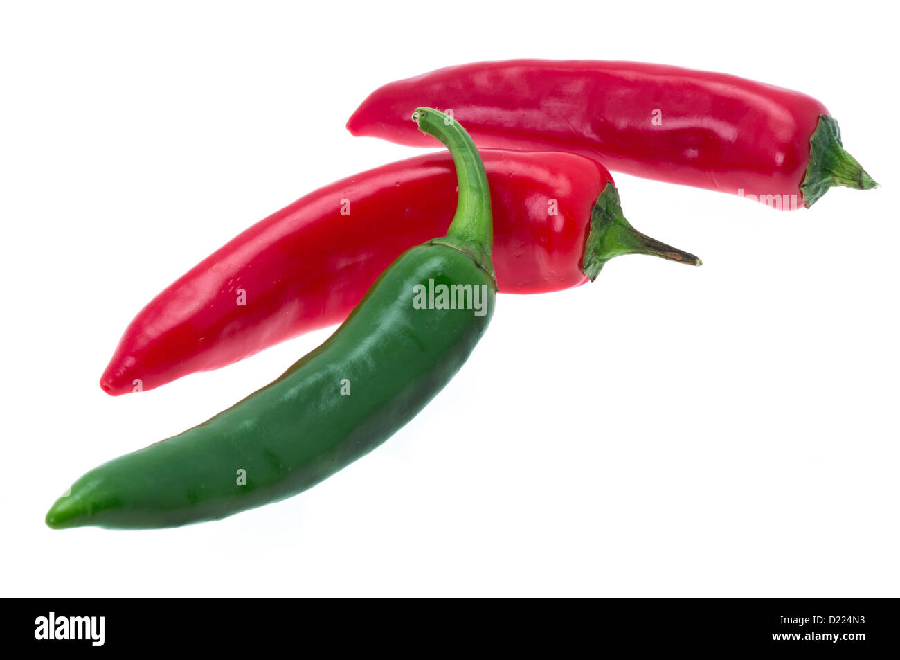 Red and green chilli peppers - studio shot with a white background Stock Photo