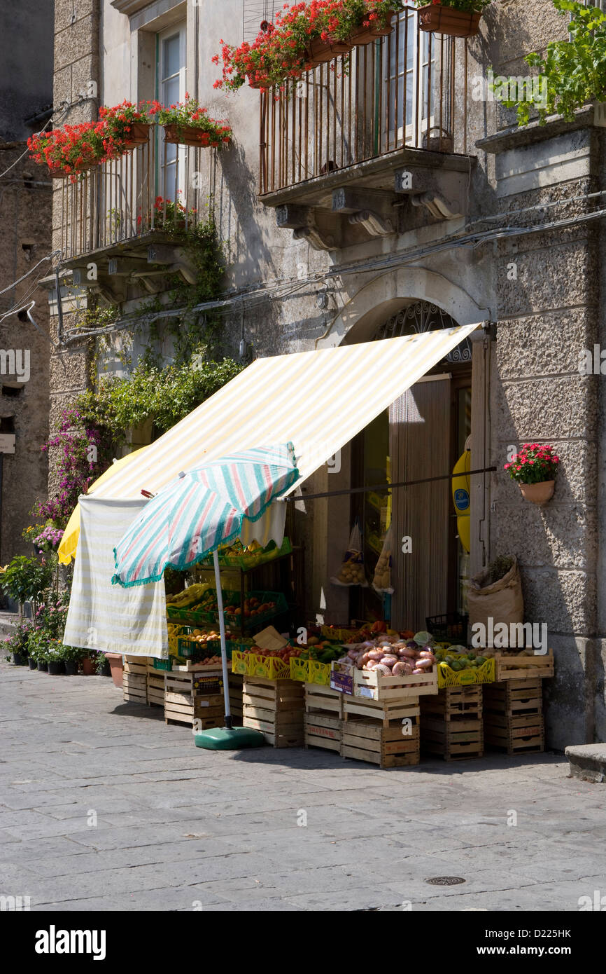 Novara di Sicilia: local fruit & veg shop with sunshade awnings Stock Photo