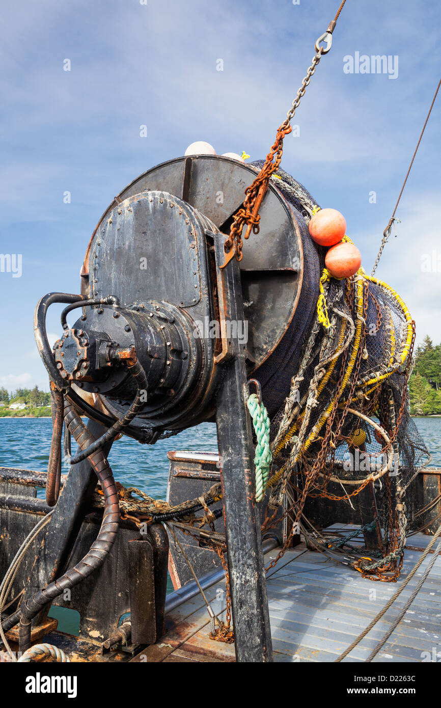 Roll of fishing net on the back of a fishing boat, Charleston Marina