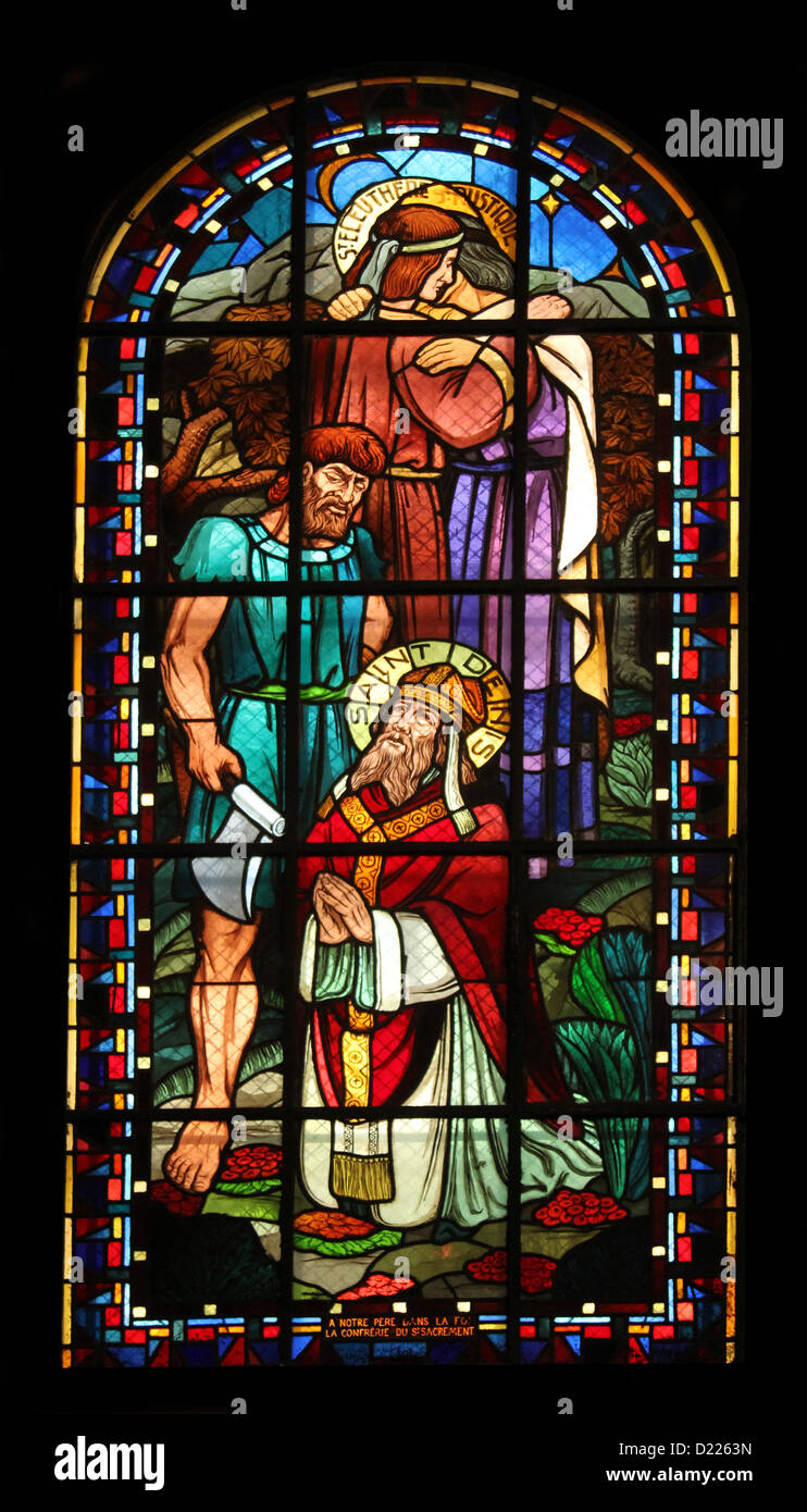 Saint Rustique, Saint Eleutherius and Saint Denis, stained glass, Notre Dame de Clignancourt church, Paris, France Stock Photo