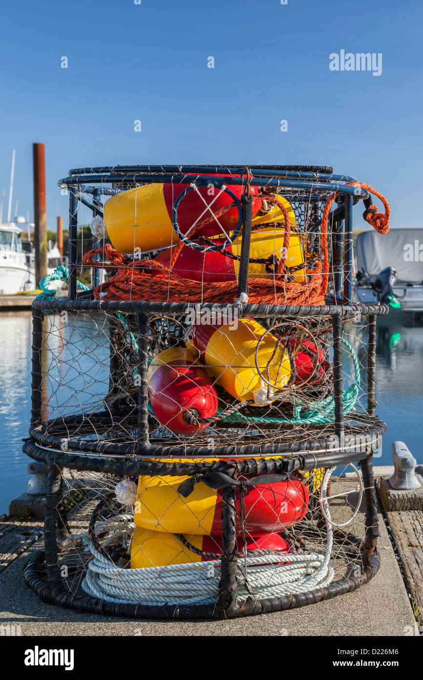 https://c8.alamy.com/comp/D226M6/stack-of-crab-pots-for-crabbing-charleston-marina-oregon-D226M6.jpg