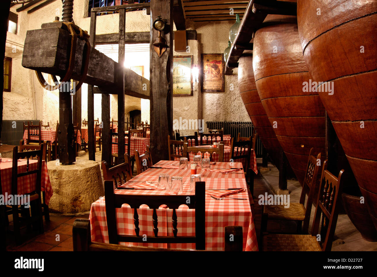 chinchon spain table lunch restaurant typical checked tablecloth chairs europe eating tinaja Stock Photo