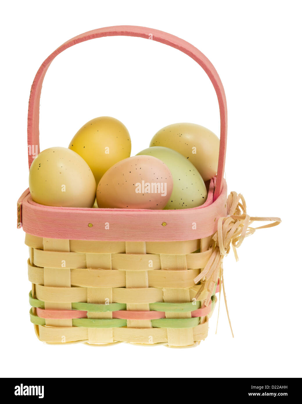 A wicker Easter basket filled with eggs Stock Photo