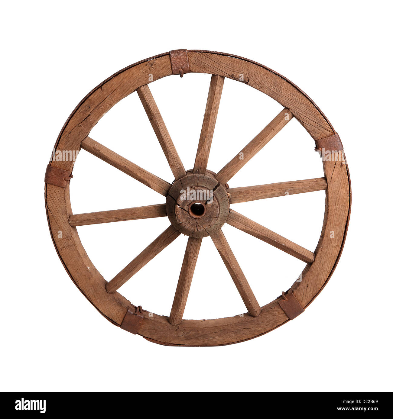 Old wooden wheel on the white background Stock Photo