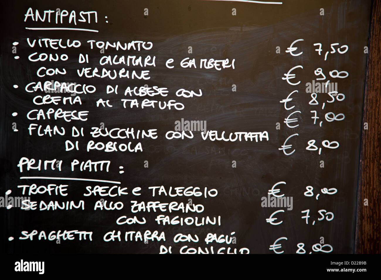 Menu board outside a restaurant in Alba Italy Stock Photo