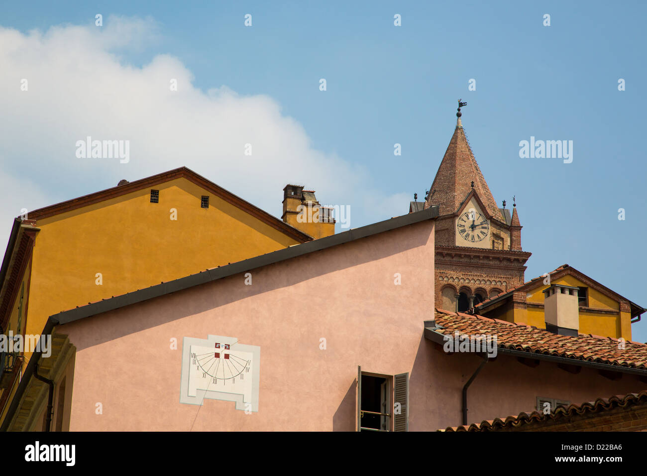 Buildings in Alba showing various architecture styles including the tower of Chiesa di San Domenica. Piedmont region in Italy Stock Photo