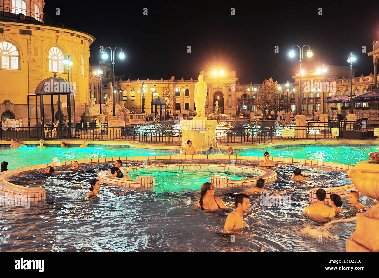 People have a thermal bath in the Szechenyi spa . Szechenyi Medicinal Bath is the largest medicinal bath in Europe. The built-u Stock Photo