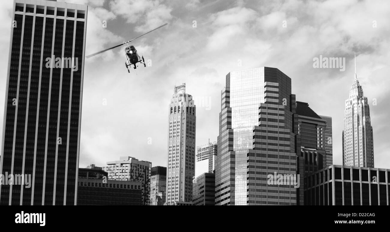 Helicopter in Flight Over Manhattan Skyscrapers, New York City--in Black and White. Stock Photo