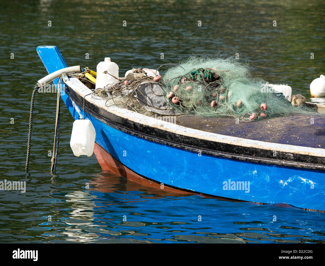 blue fishing boat on the sea Stock Photo - Alamy