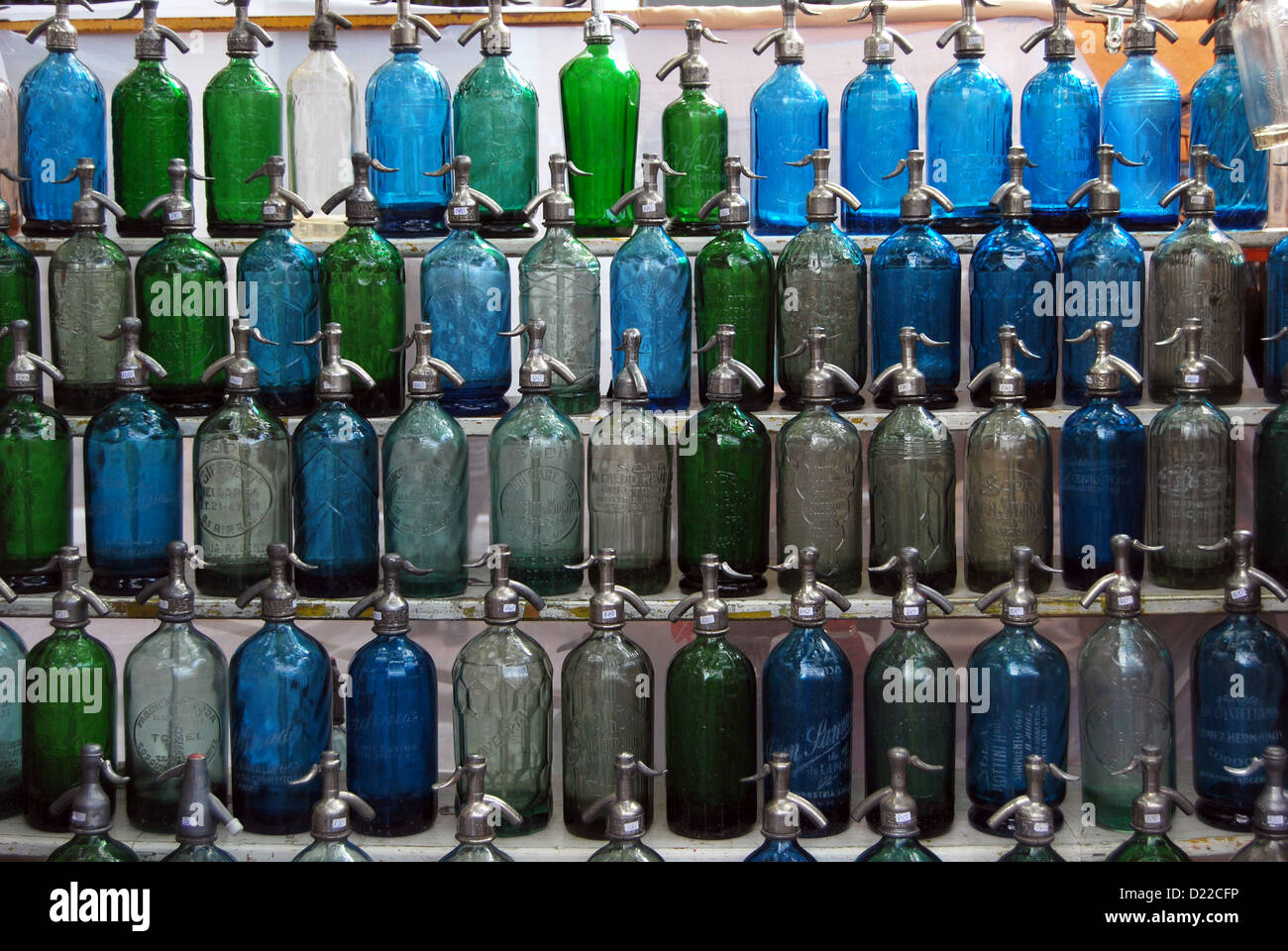 Vintage antique seltzer bottles for sale at flea market in the San Telmo district Buenos Aires,  Argentina. Stock Photo