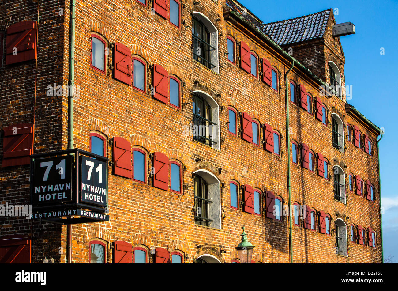 Facade of an old harbor building, today hotel, Nyhavn Hotel 71. Copenhagen, Denmark, Europe. Stock Photo