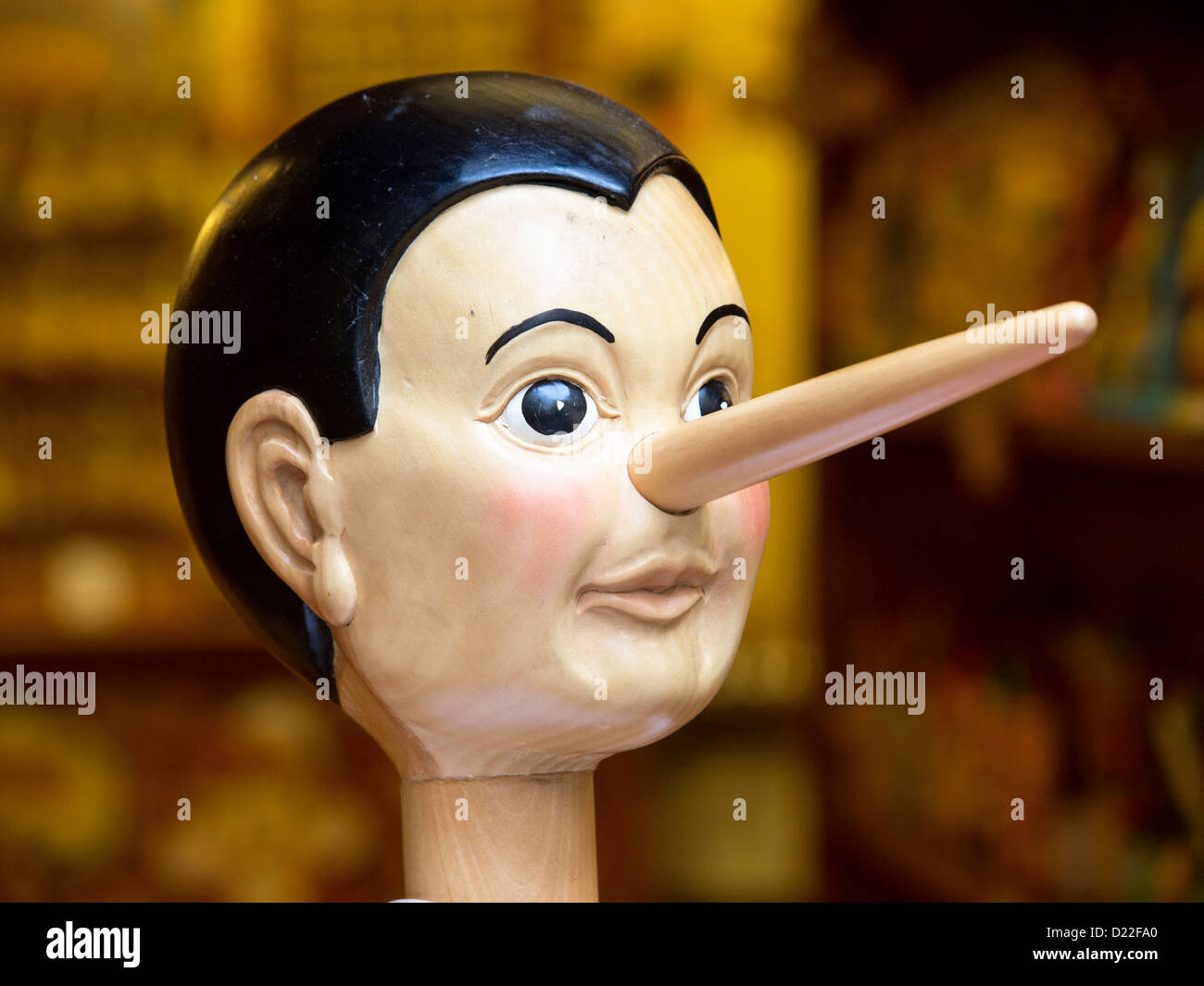 Wooden pinocchio doll with his long nose Stock Photo