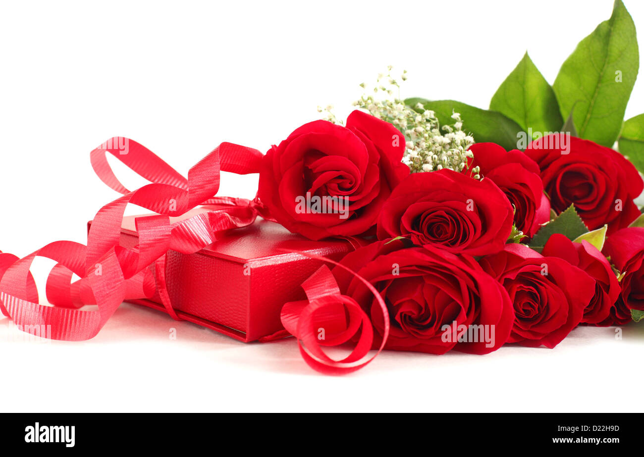 Red roses bouquet and gift box on white background Stock Photo - Alamy