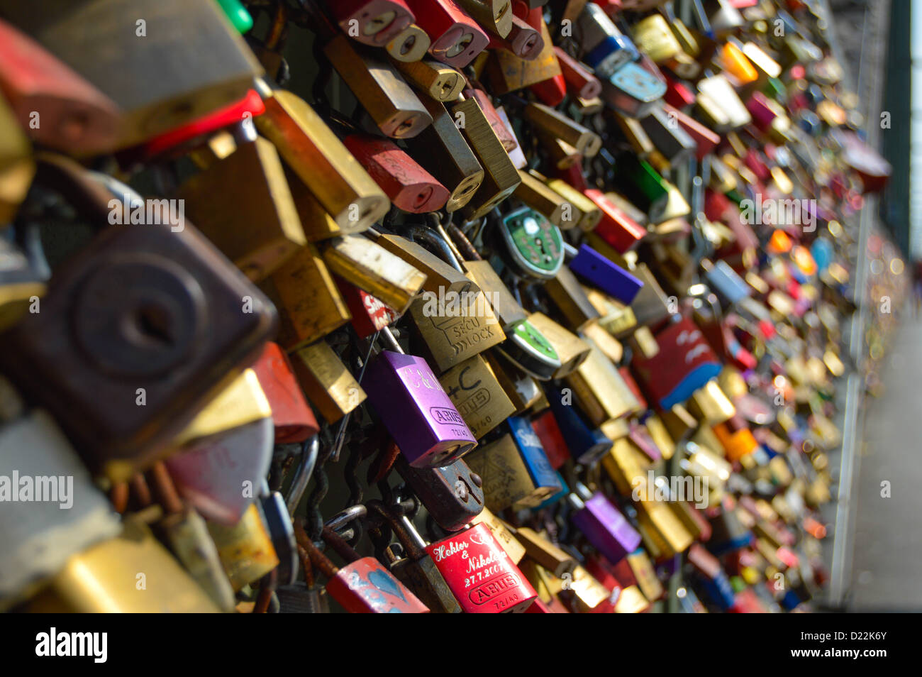 Locks of love padlocks chained to the railings of the Köln railway