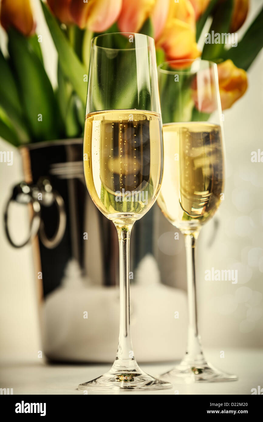champagne flutes and tulips Stock Photo Alamy