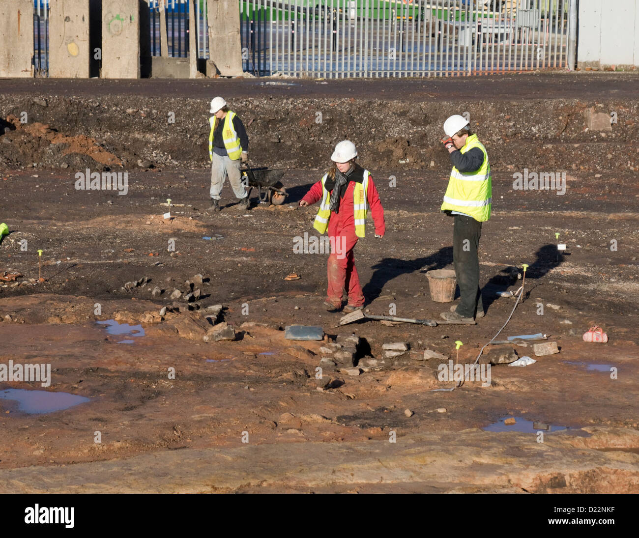 Archaeologists from BaRAS, the Bristol and Region Archeology Services carrying out a dig at Wapping Wharf;  Bristol Harbour. Stock Photo